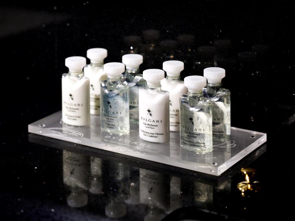 a group of bottles sitting on a tray at THE HOTEL SANRAKU KANAZAWA 21th December 2022 OPEN in Kanazawa