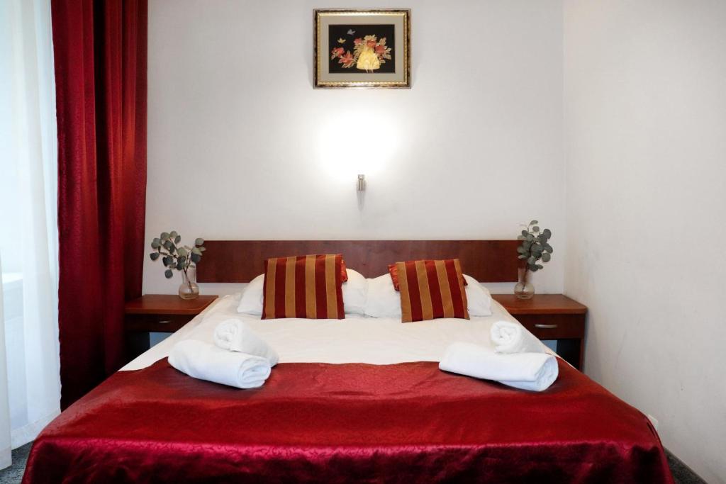 Posteľ alebo postele v izbe v ubytovaní Hotel Lothus