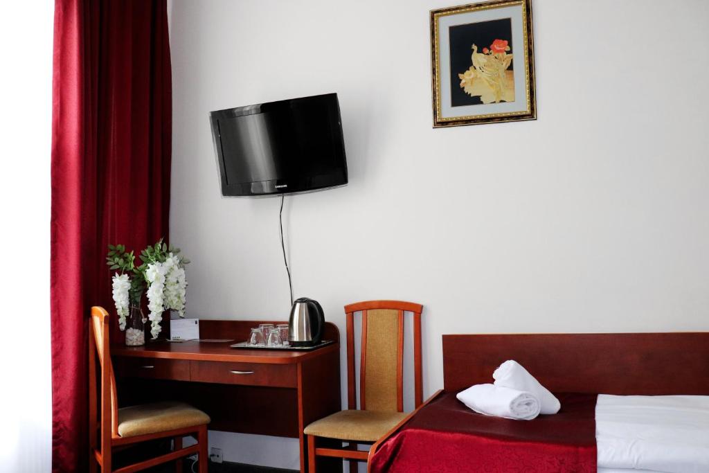 Posteľ alebo postele v izbe v ubytovaní Hotel Lothus