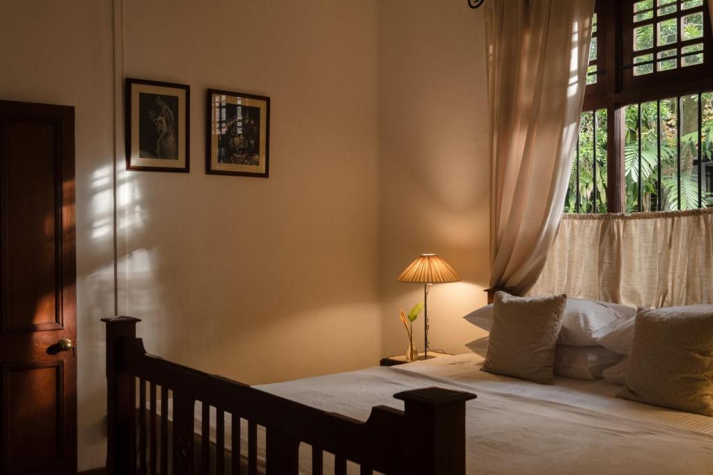 Postel nebo postele na pokoji v ubytování Havelock Place Bungalow