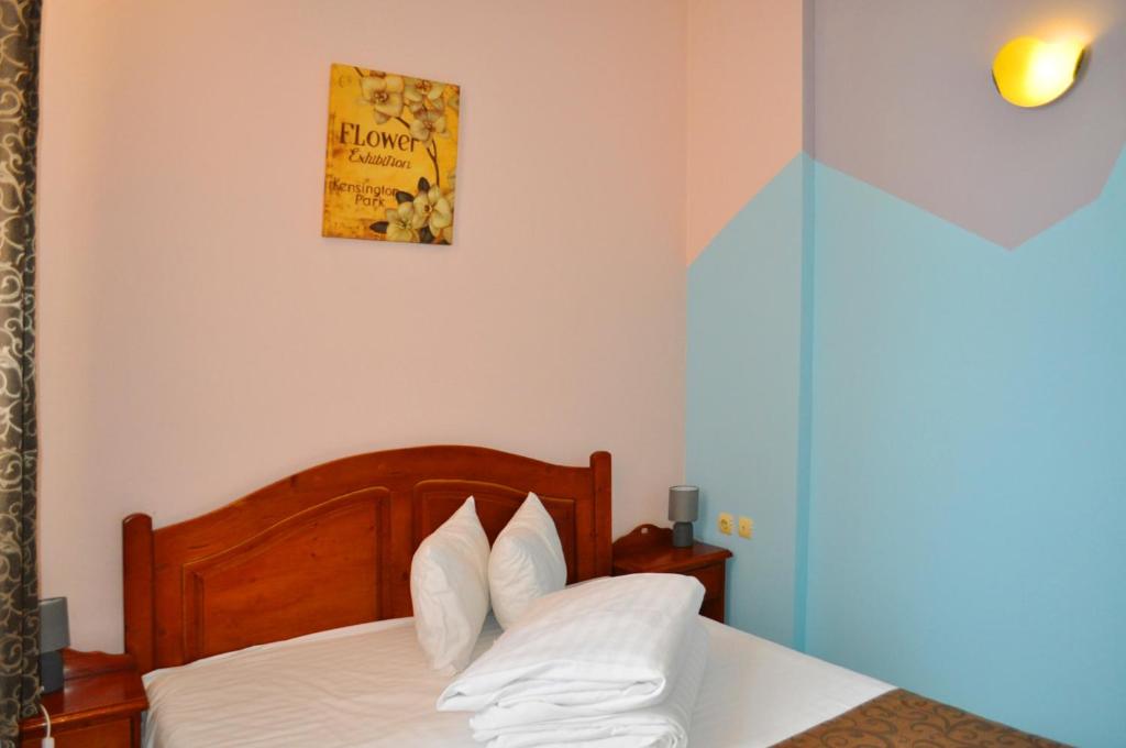 Postel nebo postele na pokoji v ubytování Pension Flamingo