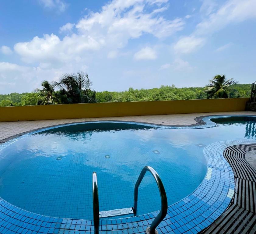 Swimmingpoolen hos eller tæt på Dindings Pantai Desair Apartment By DPD