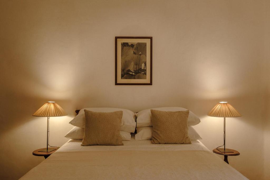 Postel nebo postele na pokoji v ubytování Havelock Place Bungalow