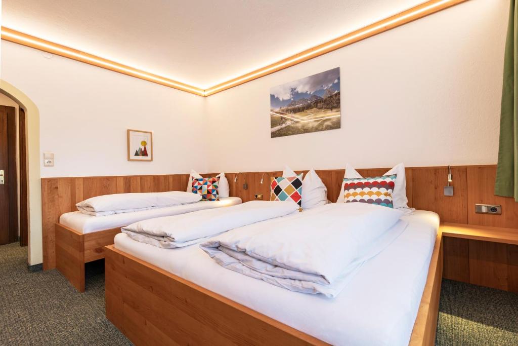 Postel nebo postele na pokoji v ubytování Mountain Fresh - alpine easy stay