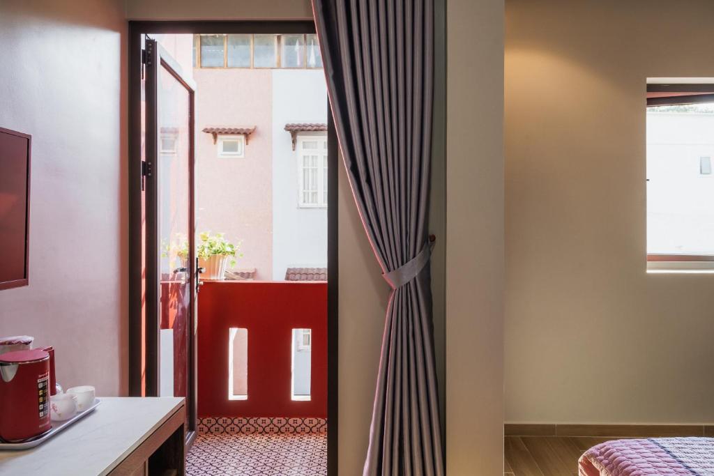 Giường trong phòng chung tại Thảo Nguyên House