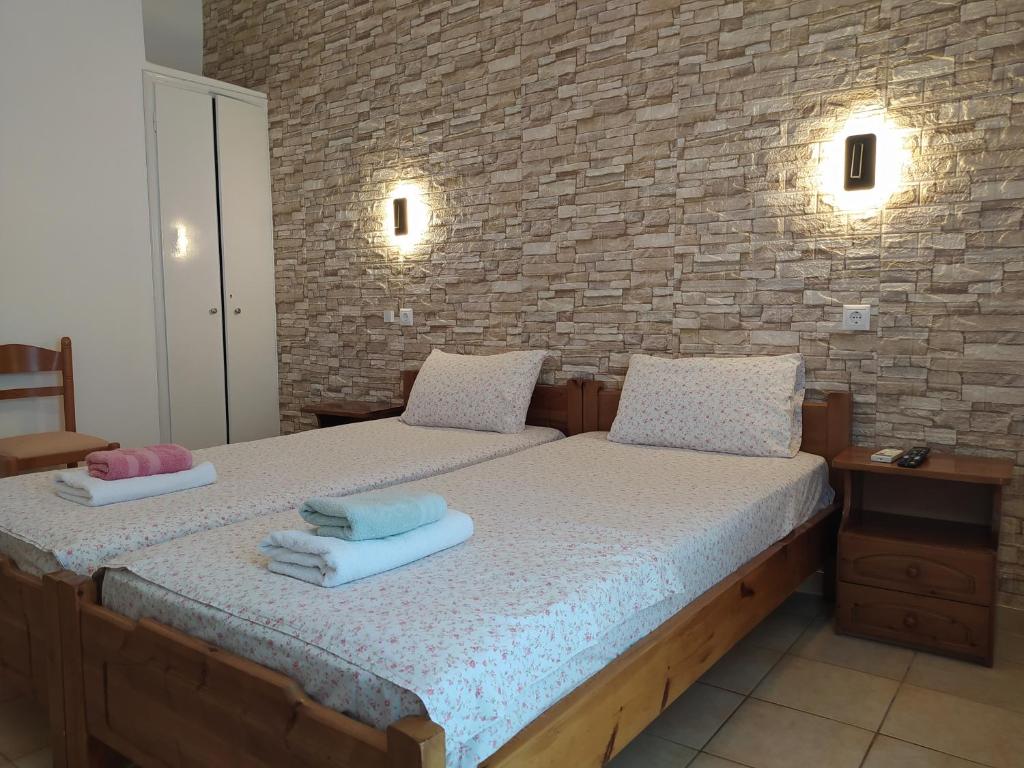 Postel nebo postele na pokoji v ubytování Corali Hotel