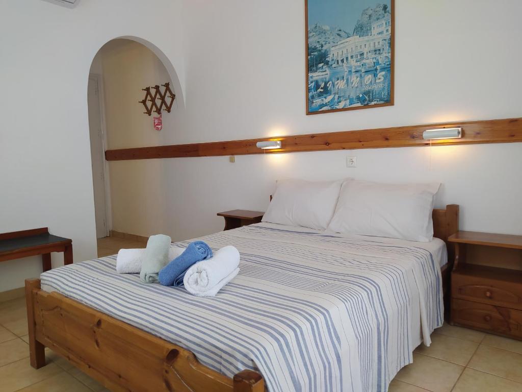 Postel nebo postele na pokoji v ubytování Corali Hotel