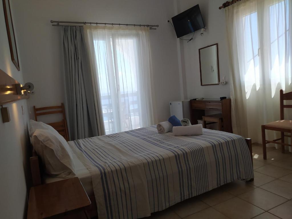 Postel nebo postele na pokoji v ubytování Corali Hotel