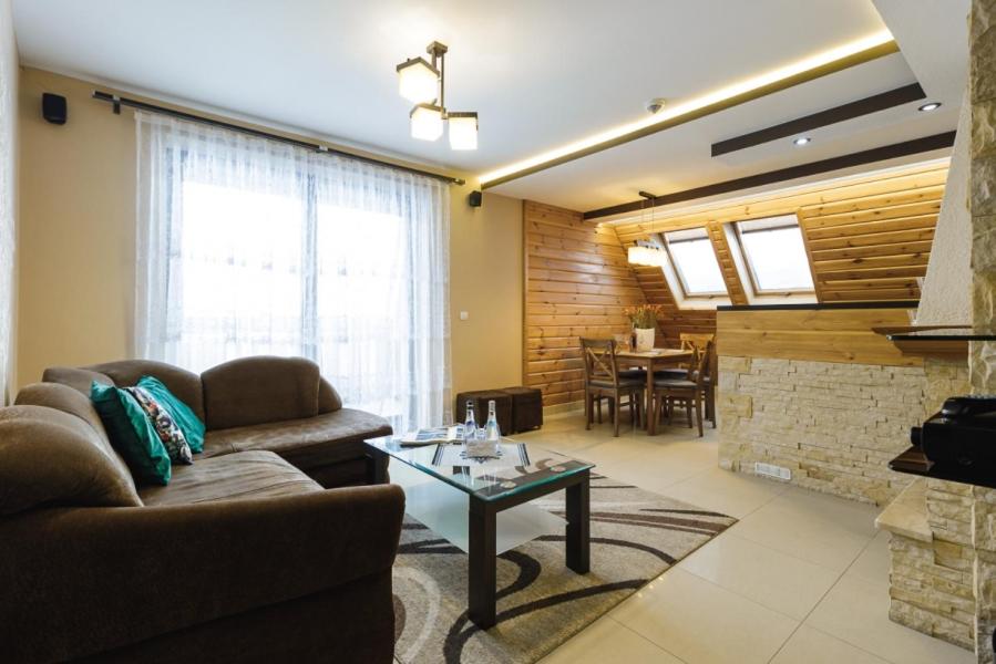 Posedenie v ubytovaní Mountain Apartments Butorowy Sauna Residence