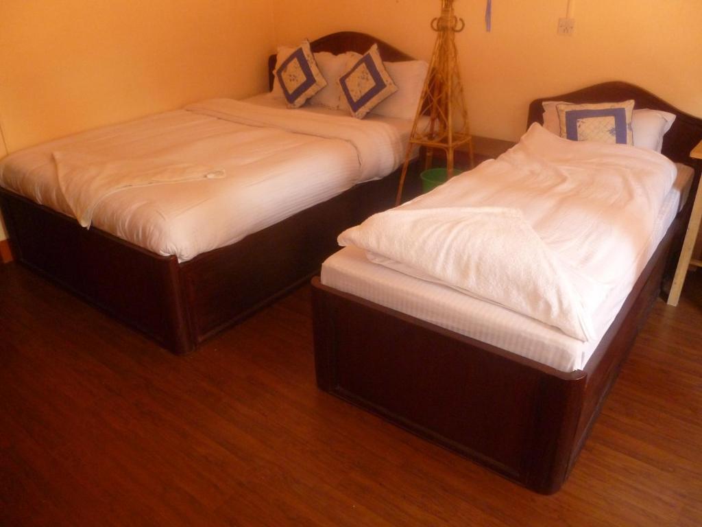Postel nebo postele na pokoji v ubytování Andes House