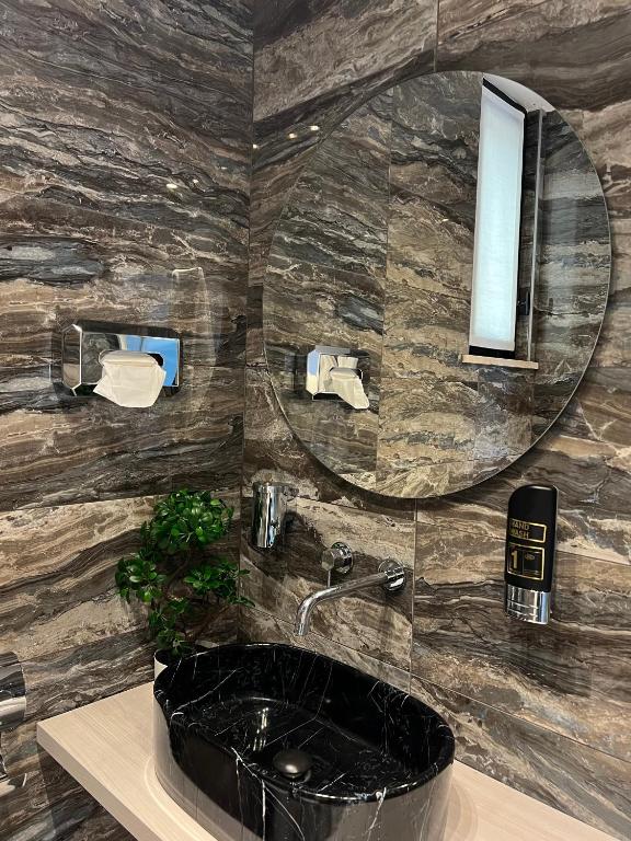 Een badkamer bij Loft Sirmione