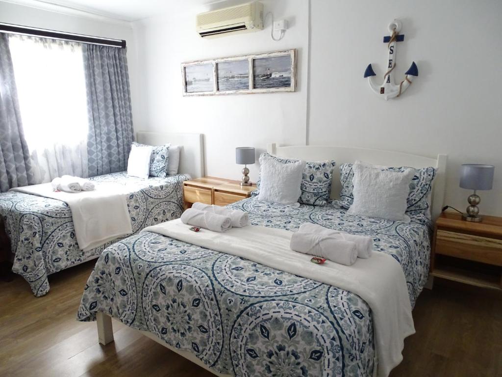 Letto o letti in una camera di Big Skies Guesthouse