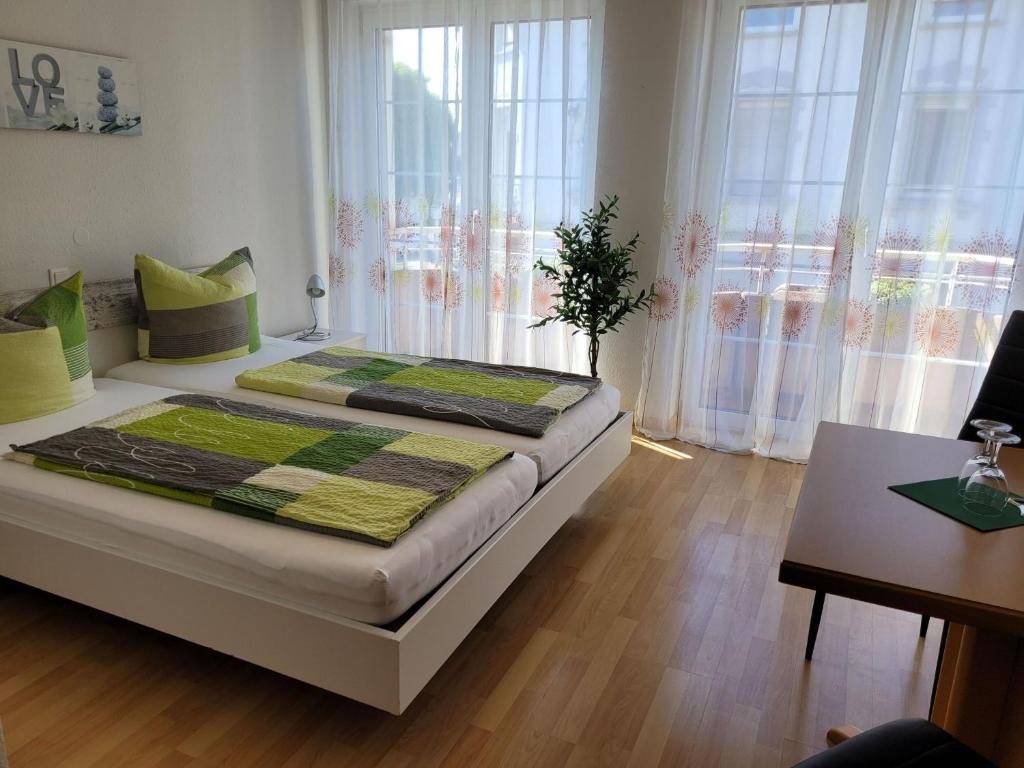 Postel nebo postele na pokoji v ubytování Hotel Scheffelhof
