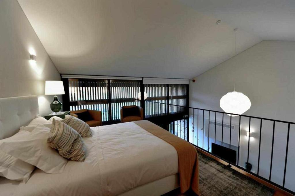 Cama ou camas em um quarto em Casas do Ermo - Ermo Villas