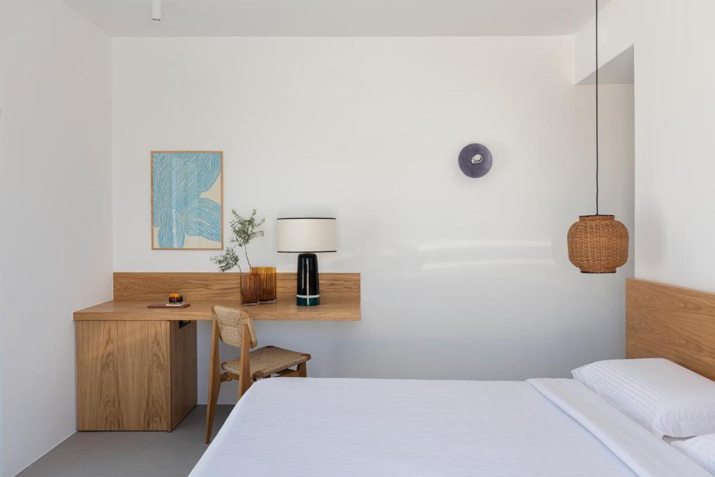 Postel nebo postele na pokoji v ubytování Viva Nove Suites