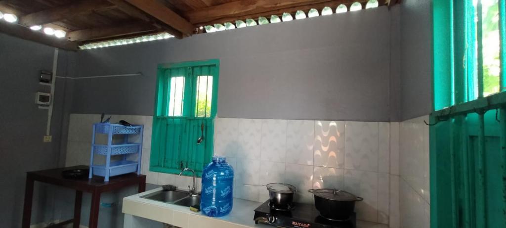 Kuchyň nebo kuchyňský kout v ubytování O'hamok family homestay