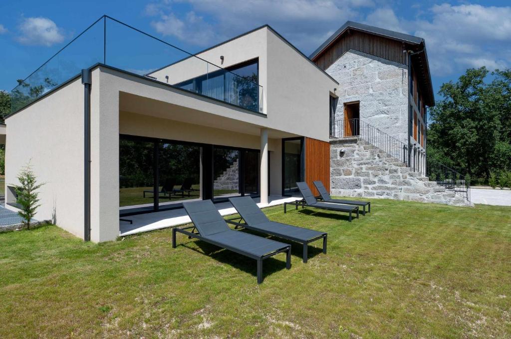 Um jardim em Ermo Loft - Casas do Ermo