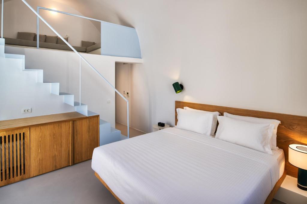 Postel nebo postele na pokoji v ubytování Viva Nove Suites