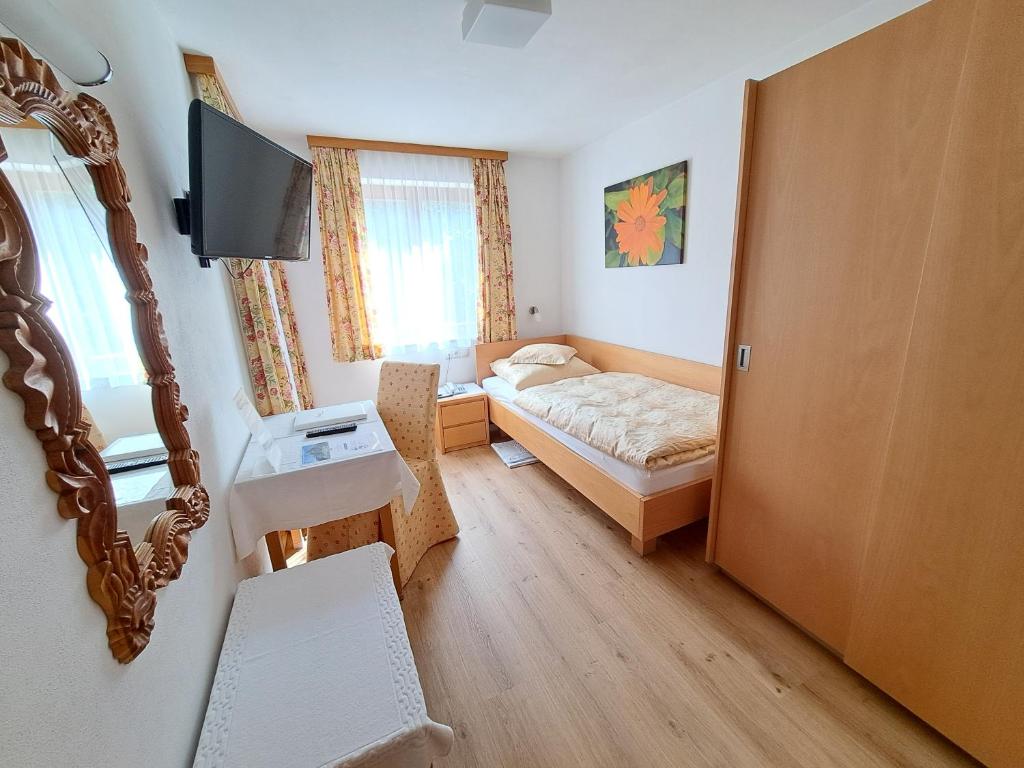 Postel nebo postele na pokoji v ubytování Pension Mallaun