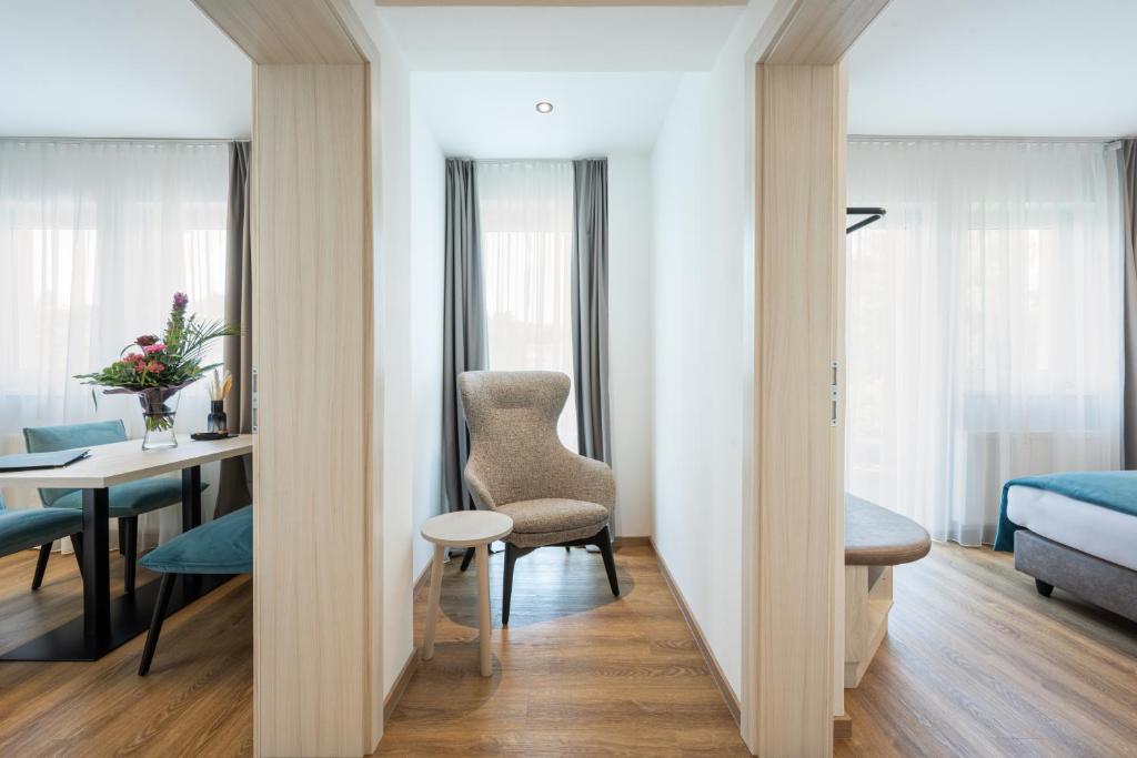 Postel nebo postele na pokoji v ubytování Hotel Villa Flora