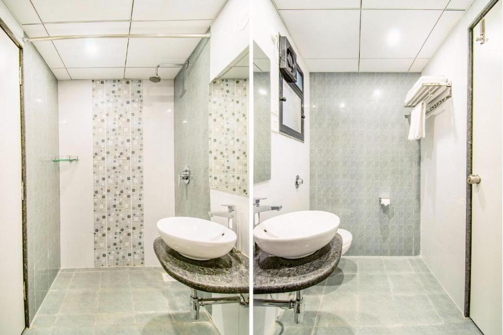 Koupelna v ubytování Magnus Square Business Hotel near Pune Airport