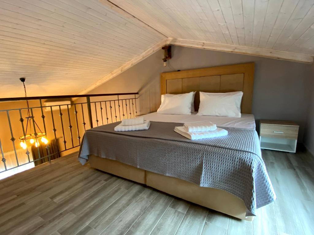 Postel nebo postele na pokoji v ubytování Vot villas