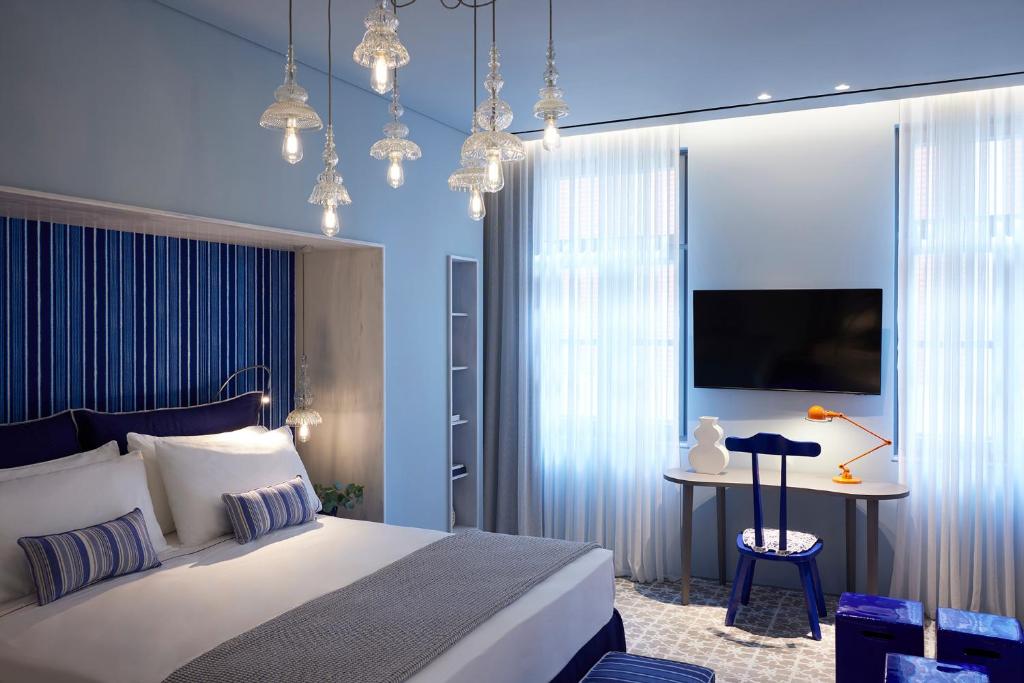 Łóżko lub łóżka w pokoju w obiekcie Hotel Fresh