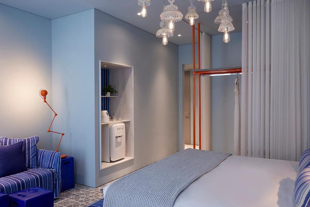 Łóżko lub łóżka w pokoju w obiekcie Hotel Fresh