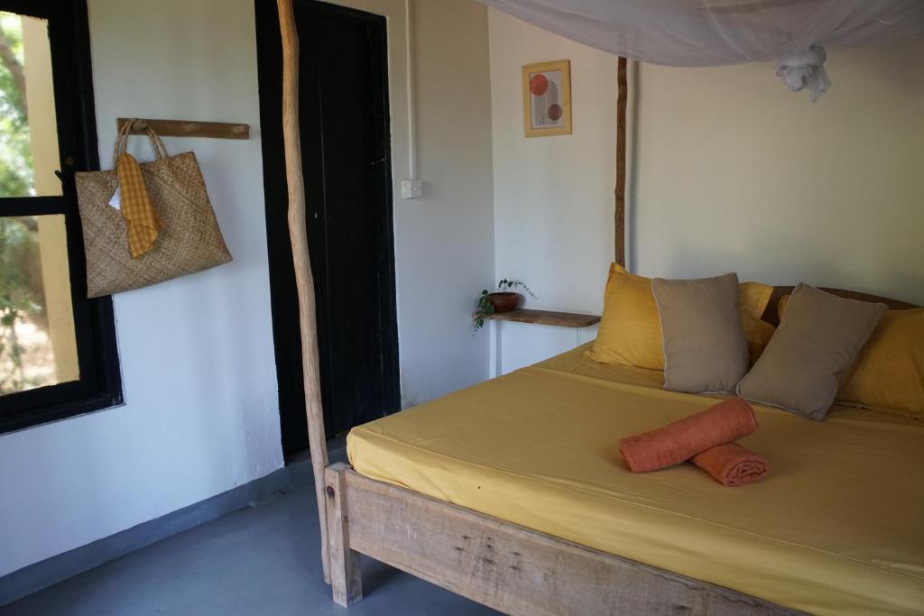 Postel nebo postele na pokoji v ubytování Hilltop Cabanas