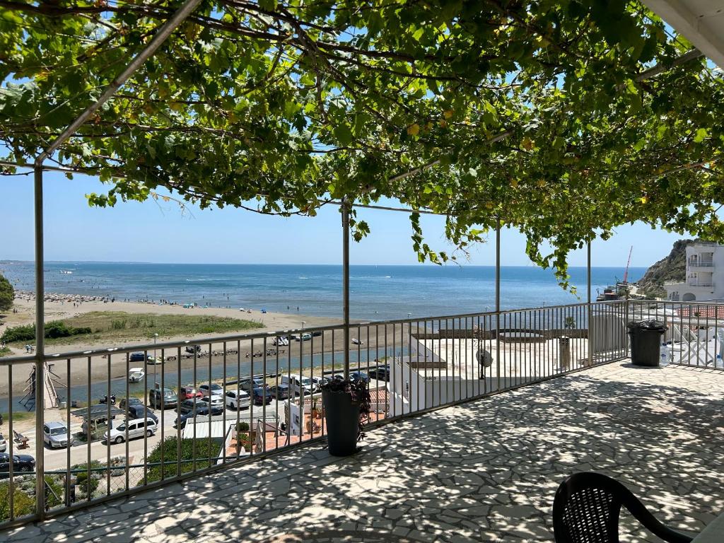 a balcony with a view of the beach at Apartments Doda in Ulcinj