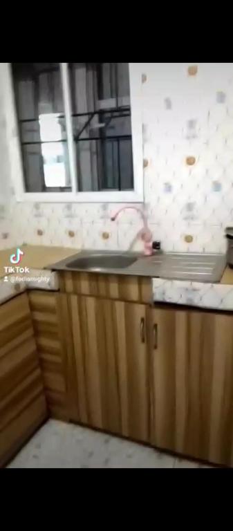 Kuchyň nebo kuchyňský kout v ubytování Funkytee Hotel & Apartment