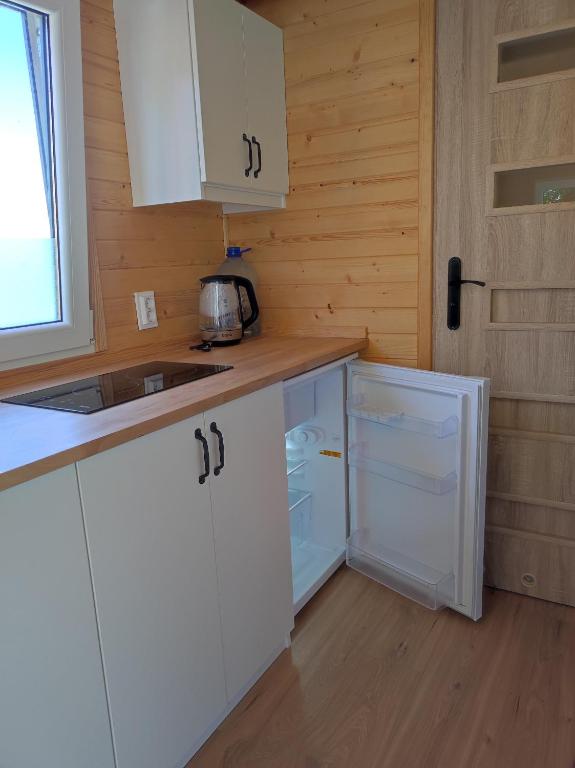 Kuchyň nebo kuchyňský kout v ubytování Mobile Tinyhouse by Wolfsberger