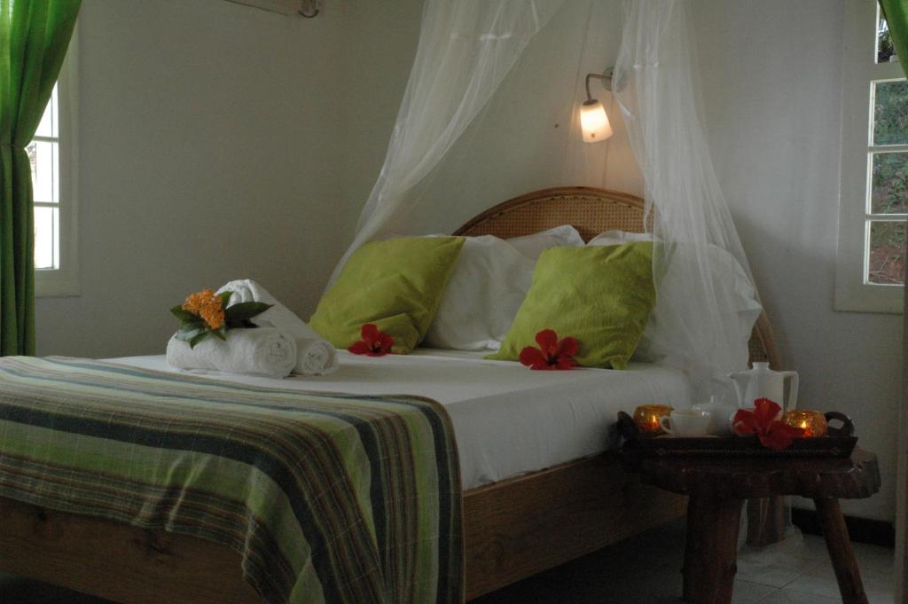 Postel nebo postele na pokoji v ubytování Kokogrove Chalets