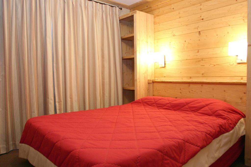 Postel nebo postele na pokoji v ubytování Vacancéole - Résidence Cortina