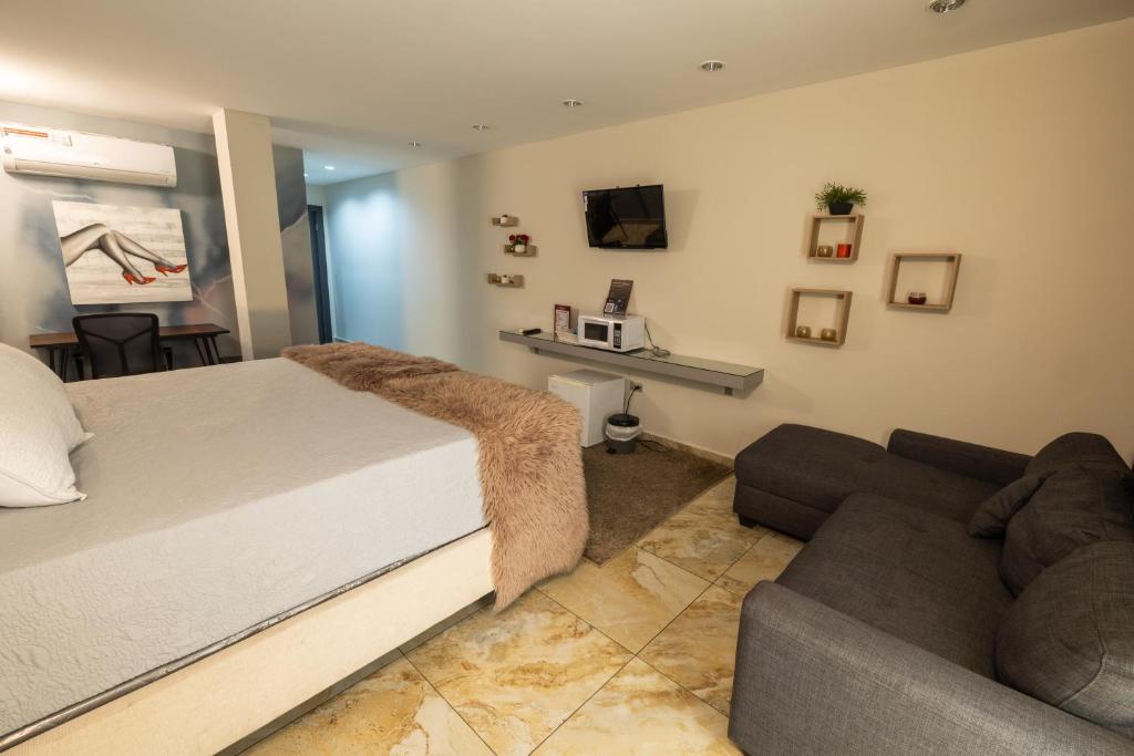 TV a/nebo společenská místnost v ubytování Basha Hotel & Restaurant