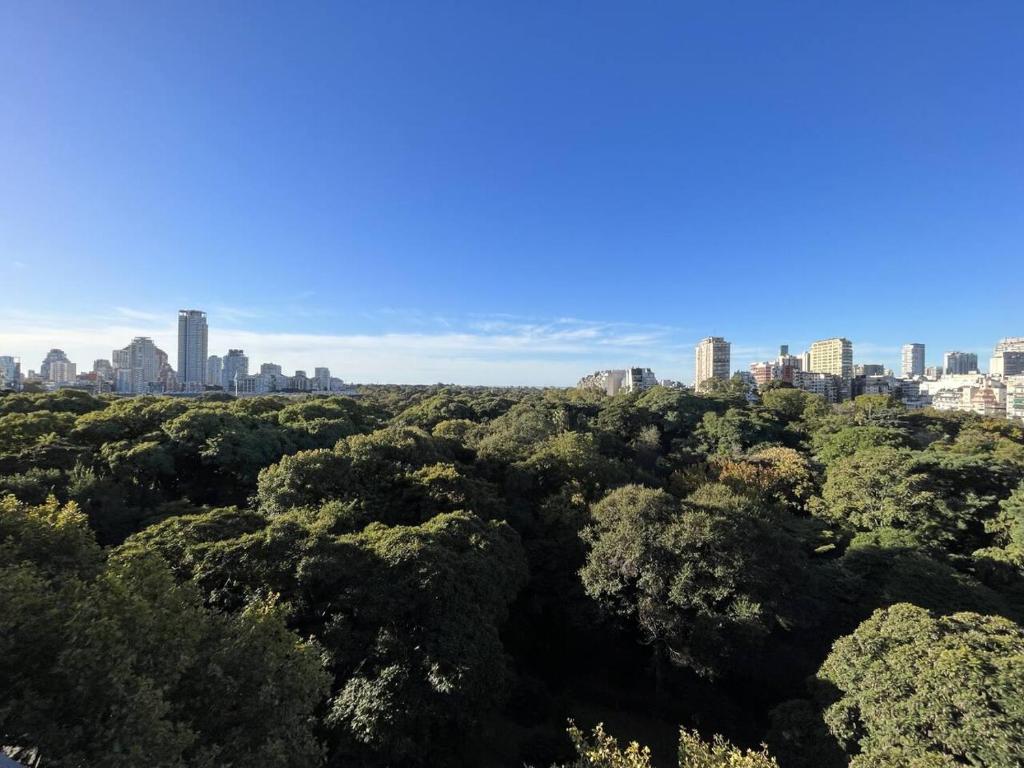 an aerial view of a city skyline with trees at Mansion Botánico Premium Buenos Aires in Buenos Aires