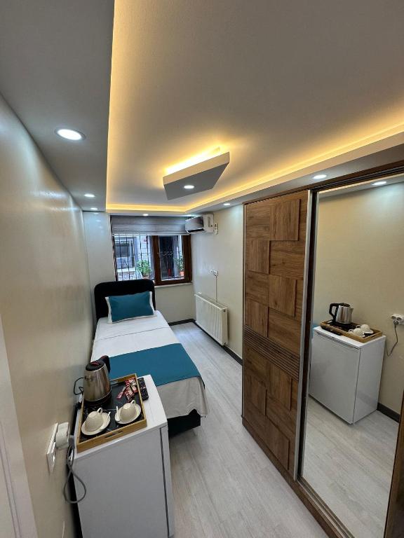 Kuchyň nebo kuchyňský kout v ubytování Palladium APART Hotel