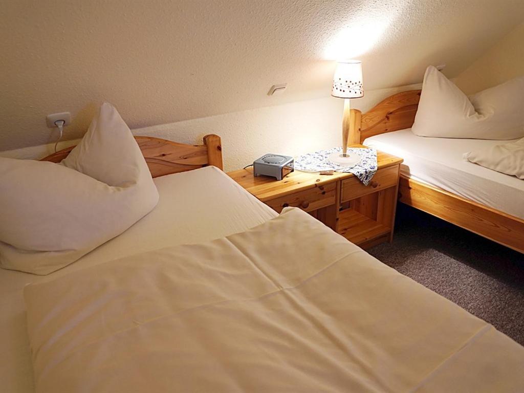 Postel nebo postele na pokoji v ubytování Zur Wildgans
