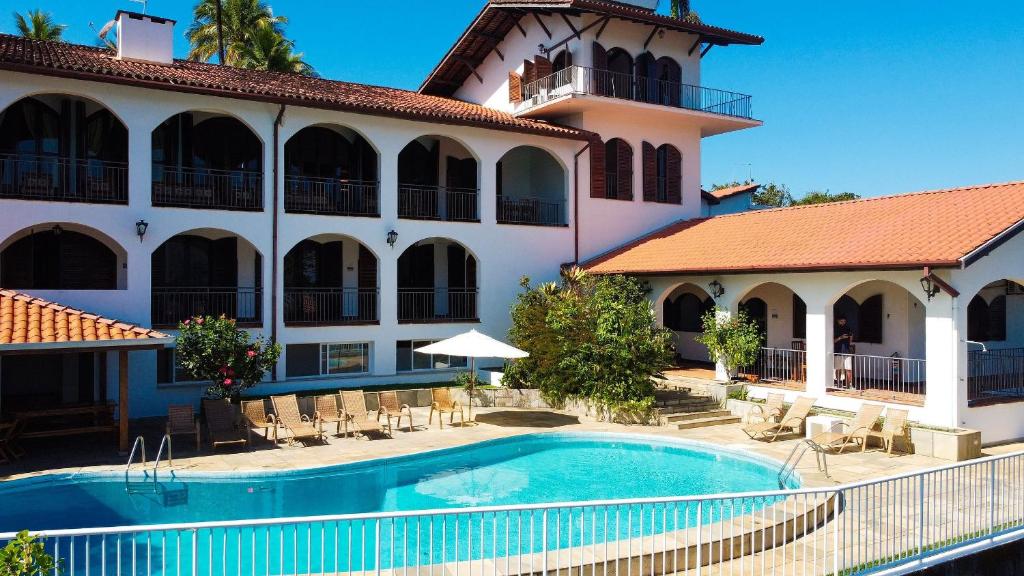 Bazén v ubytovaní Casa luxo, com 9 quartos vista mar Ubatuba alebo v jeho blízkosti