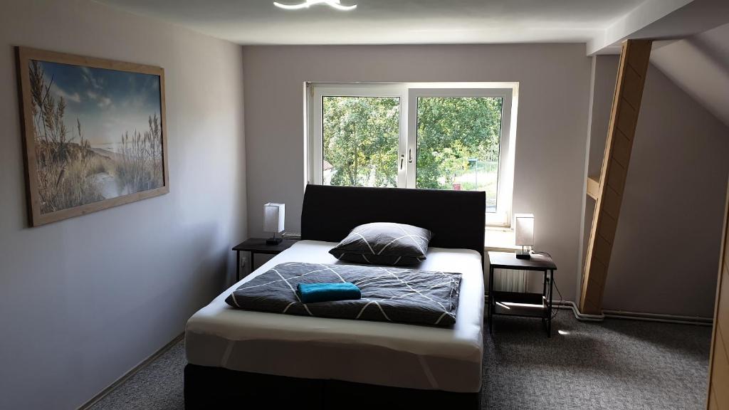Postel nebo postele na pokoji v ubytování BIG Apartment - 150qm in Bad Liebenwerda