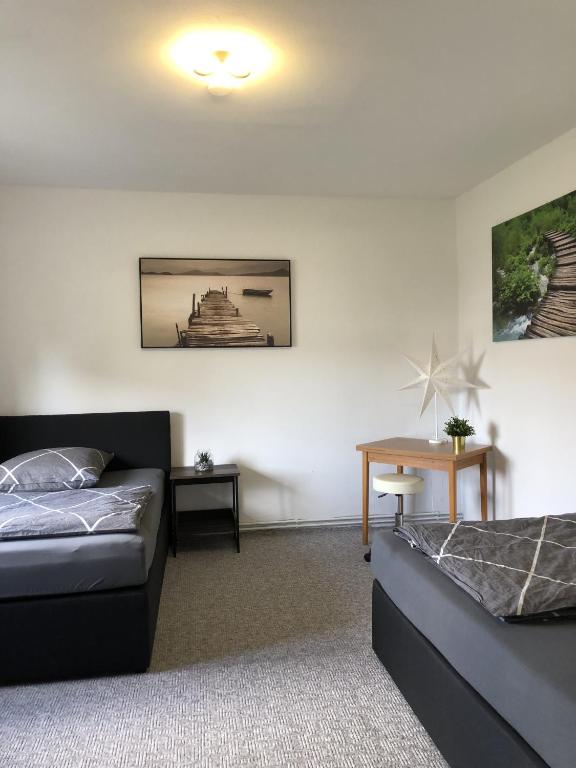 Postel nebo postele na pokoji v ubytování BIG Apartment - 150qm in Bad Liebenwerda