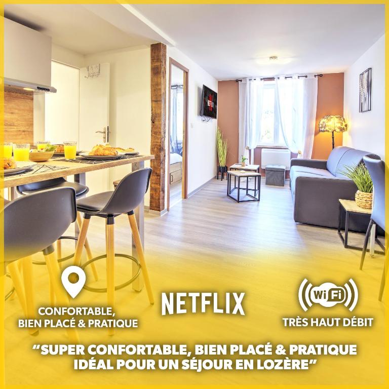 Il comprend une cuisine et un salon. dans l'établissement Le Sabot - Netflix/Wi-Fi Fibre/Terasse - 4 pers, à Banassac