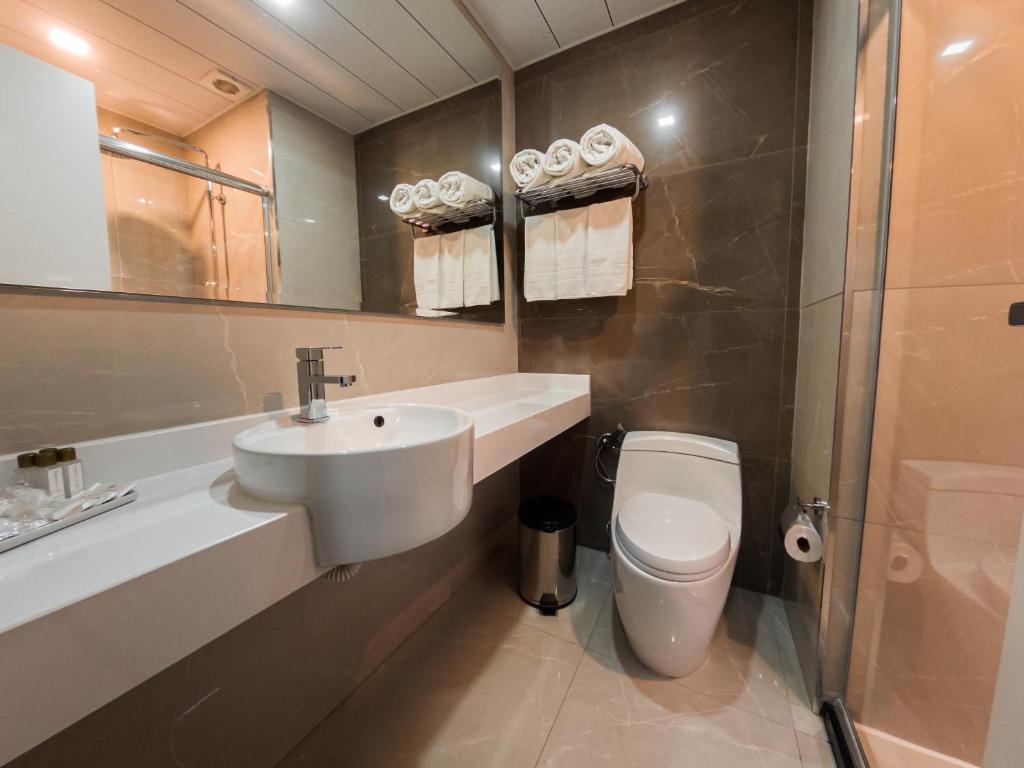 Koupelna v ubytování Bello Hotel