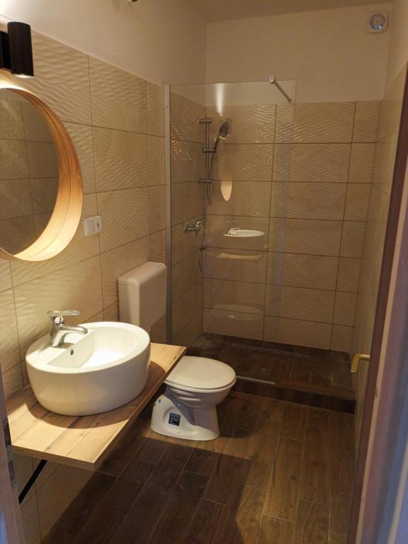 Kúpeľňa v ubytovaní Miranda Apartmanház