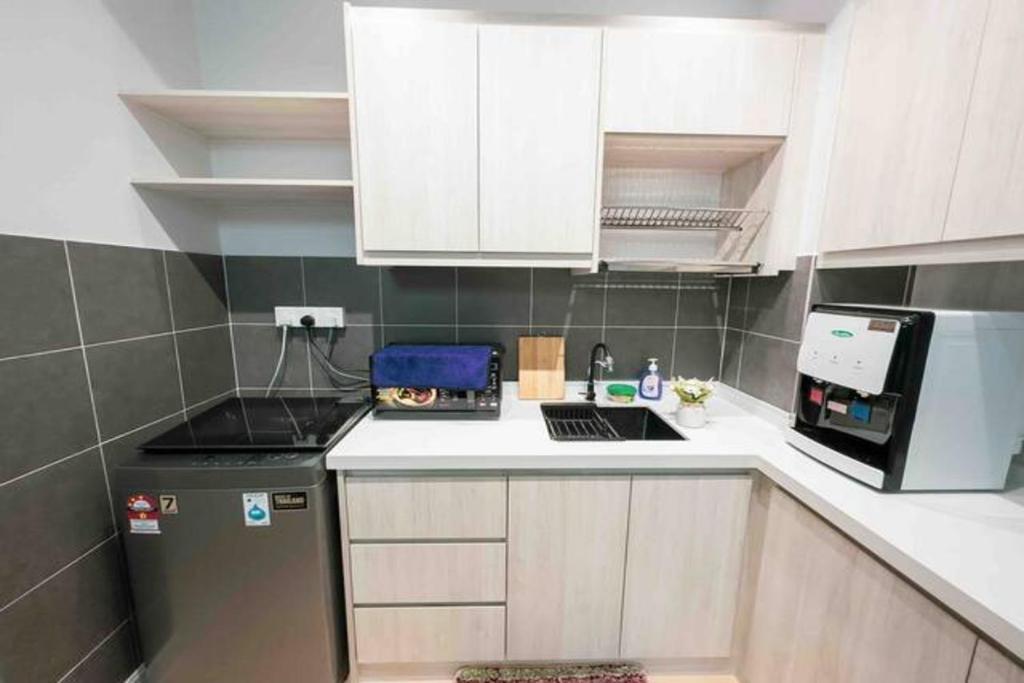 Kuchyň nebo kuchyňský kout v ubytování Netizen Cozy Suite By GUESTONIC
