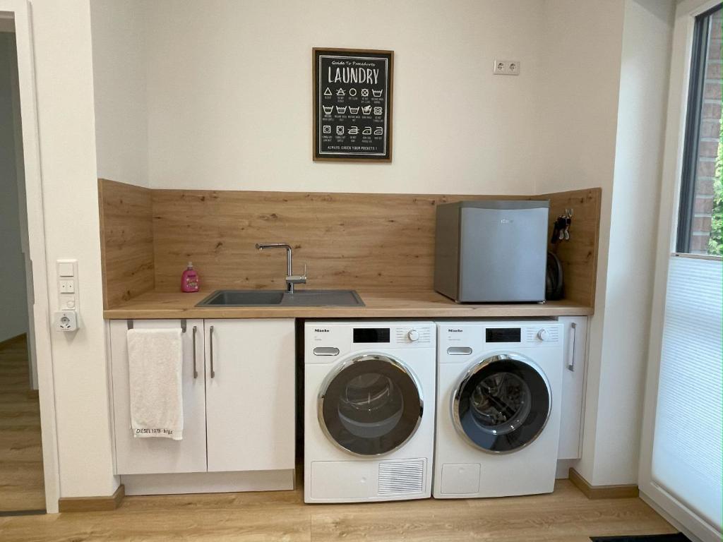 Kuchyň nebo kuchyňský kout v ubytování Ferienhaus Hallix