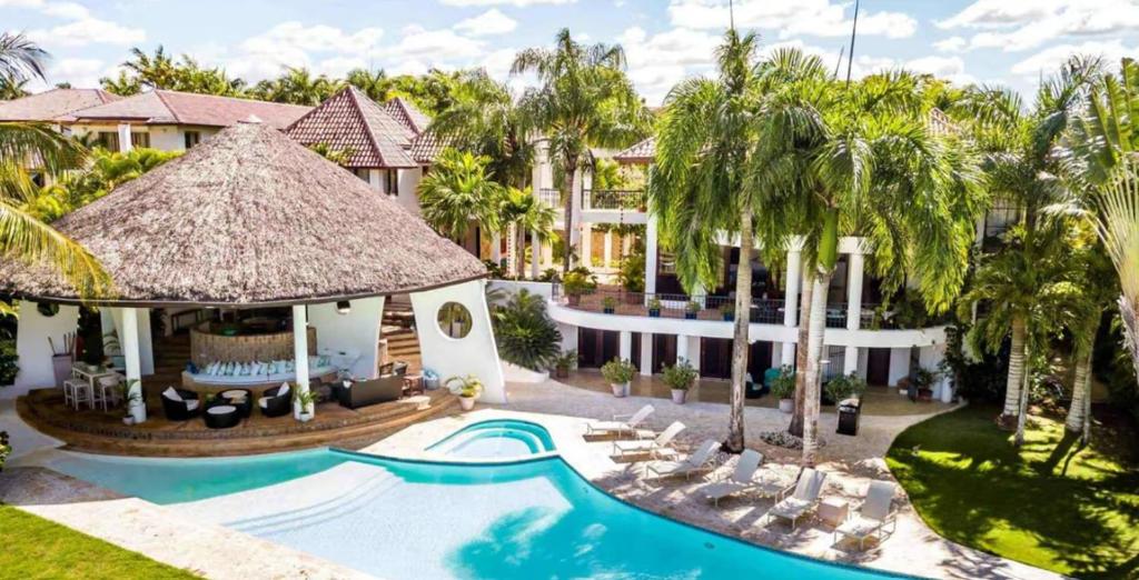 an aerial view of a house with a swimming pool at Sunny Vacation Villa No 75 in San Rafael del Yuma