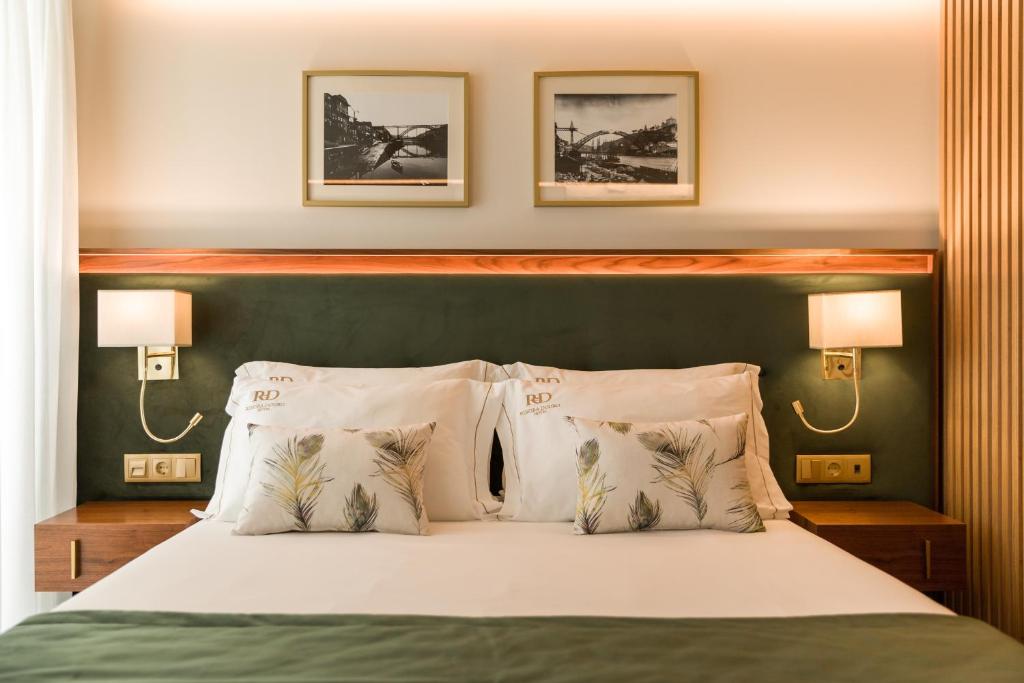 Postel nebo postele na pokoji v ubytování Ribeira Douro Hotel