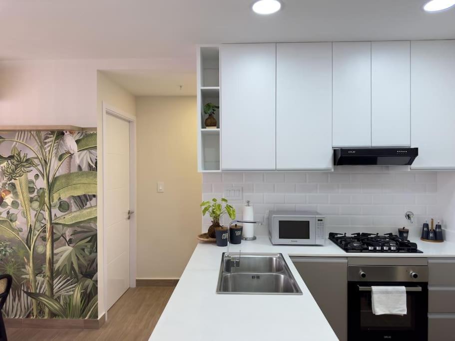 Kuchyň nebo kuchyňský kout v ubytování Isthmus Concept Apartment