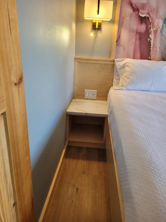 Postel nebo postele na pokoji v ubytování Greenview Inn Riverhead